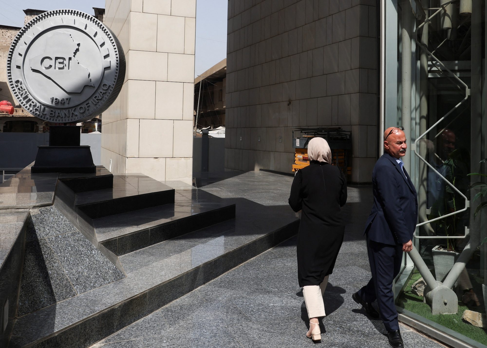 Clothing, Coat, Person The Central Bank of Iraq said that it will an existing ceiling of 500 million Iraqi dinars to 100 million dinars above which property transactions must be disclosed to the authorities money laundering