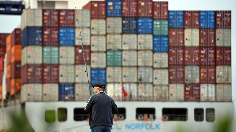 A fisherman at Port Botany in Sydney, where rail capacity is set to double