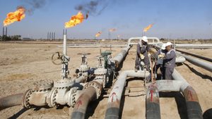 Workers at a gas facility north of Basra, Iraq. The country's huge gas reserves remain largely untapped due to underinvestment and conflict