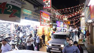 People walk in the souq in Manama, Bahrain; non-oil revenue is forecast to increase to 8.8 percent this year