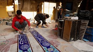 Craftsmen making traditional ceramic tiles in the holy city of Karbala, Iraq. Unemployment stood at around 16.5 percent in 2023