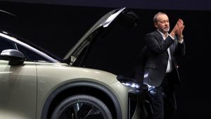 Lucid CEO Peter Rawlinson at the Los Angeles Auto Show in 2023. Lucid has been majority-owned by Saudi Arabia’s PIF since April 2019