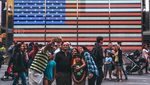 Tourists in Times Square, New York. Some Gulf countries punch above their weight when it comes to US residency applications
