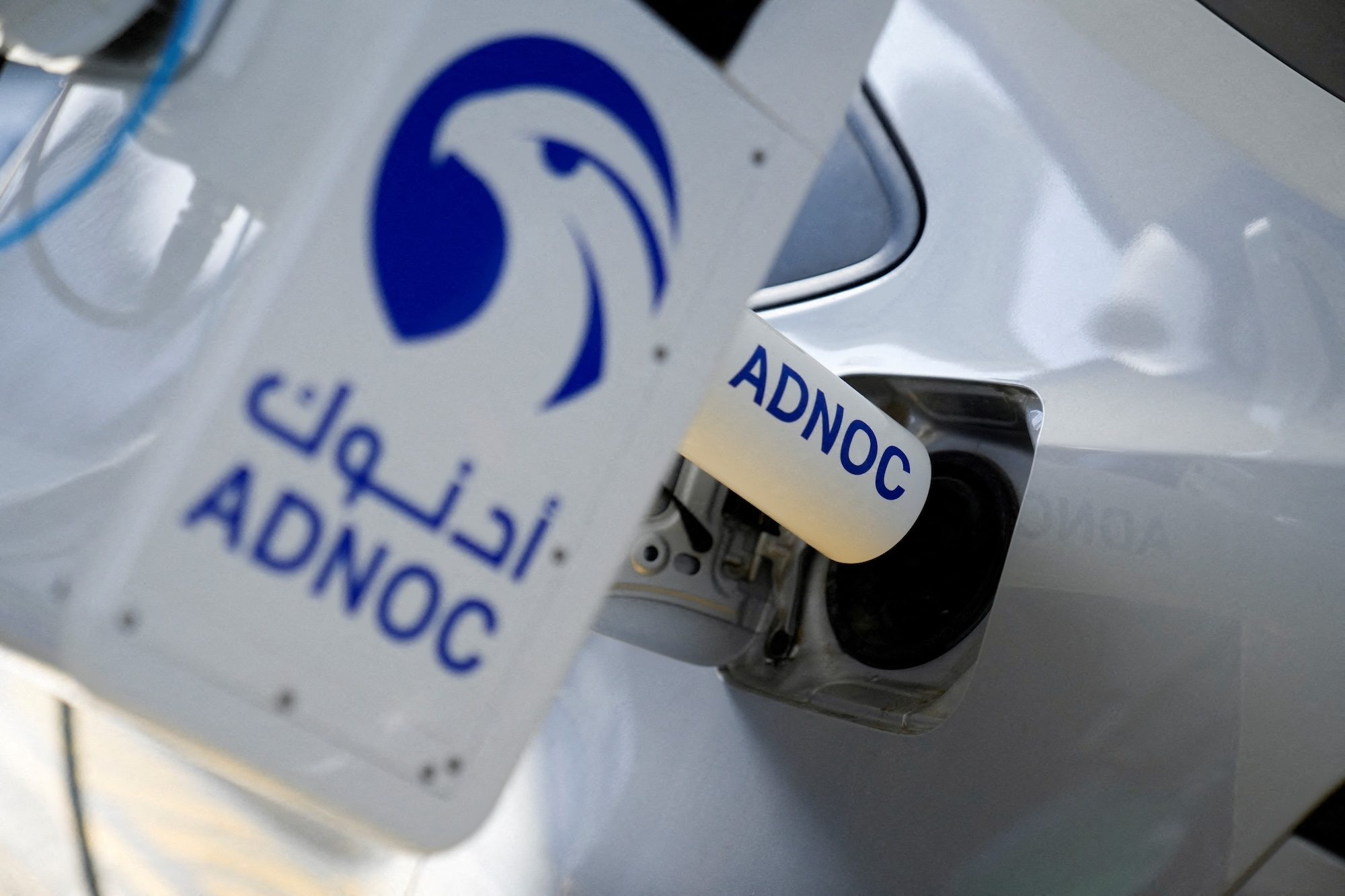 A robotic fuelling arm demonstration by Adnoc, whose investments in the United States now sit within its new international investment arm XRG