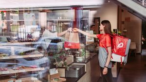 The Berlin-based food delivery company, which bought Talabat in 2015, said it will pay off its convertible bonds Delivery Hero