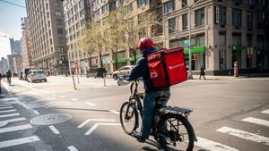 A DoorDash rider in Chelsea, New York City. PIF has bought nearly 490,000 shares in the delivery company