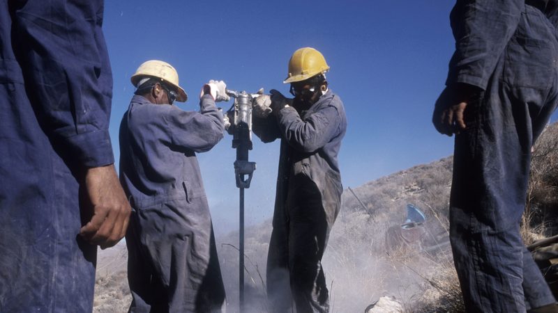 Seismic survey teams drilling lines to survey the land for gas and oil.
