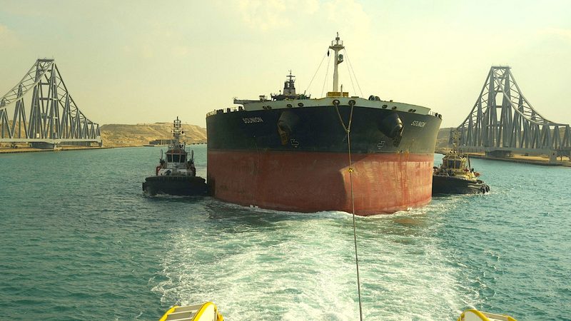 The MT Sounion being towed through Egypt's Suez Canal earlier this month after it was attacked in the Red Sea. Suez Canal revenues have dropped from $2.4bn to $1bn