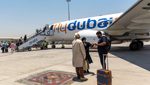 Passengers boarding a FlyDubai aircraft in Dubai. The airline's fleet is made up of narrow-body jets