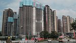 Apartment blocks under construction in Huizhou, Guangdong province. China's real estate sector has contracted sharply in recent years