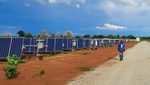 A person working on a solar site