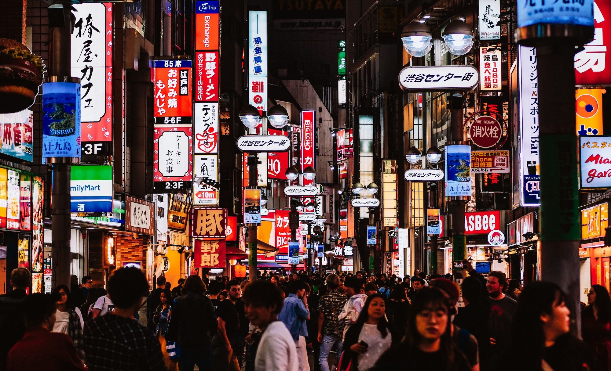 A busy Tokyo street full of neon signs and people. The Japan External Trade Organization (Jetro) said in its annual report this week that exports from the GCC totalled $84 billion in 2024