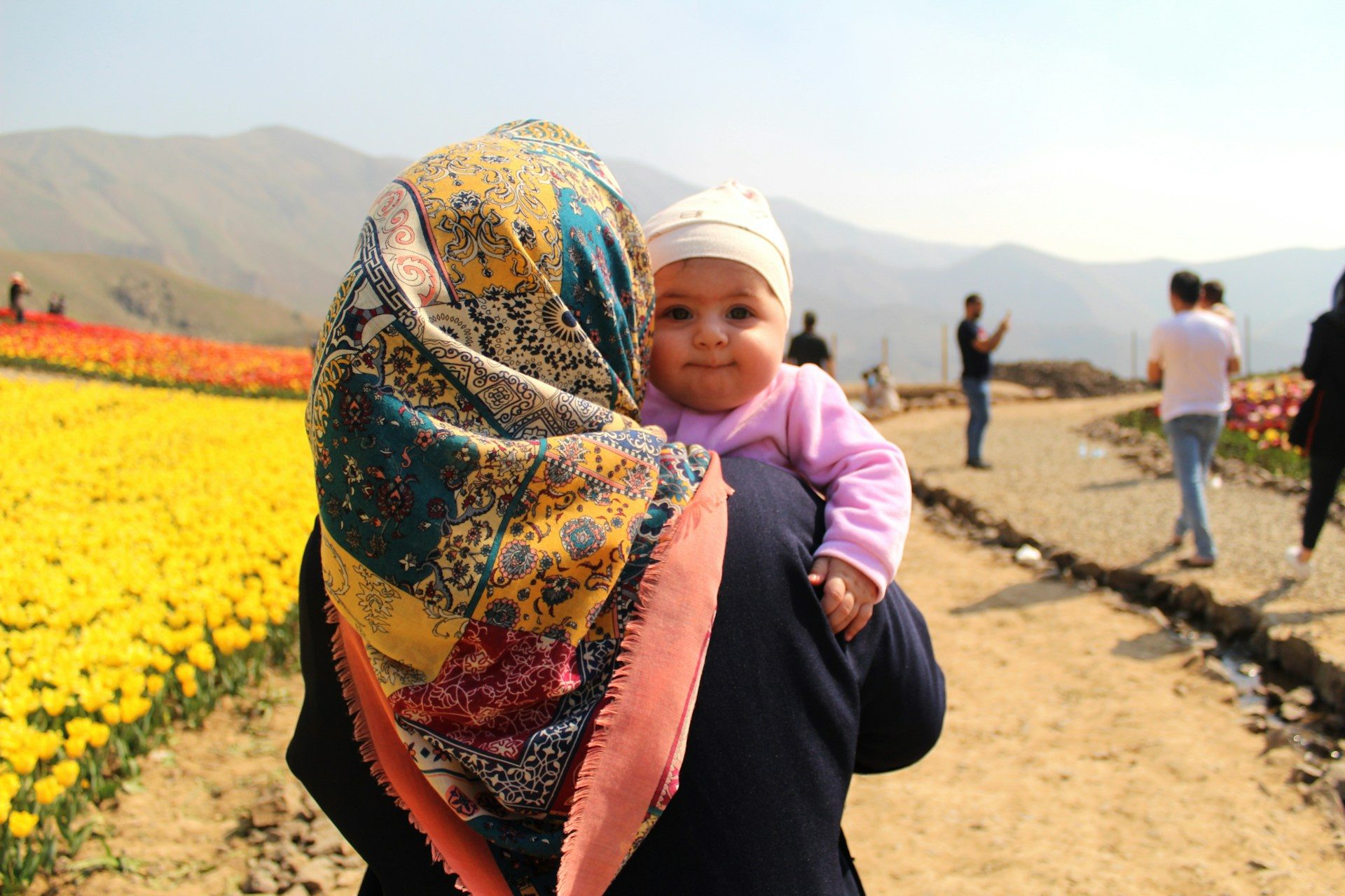 A mother and baby in Karaj, Iran, one of several Gulf states that are falling below the fertility replacement rate