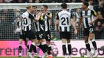 Newcastle United players in a match versus Nottingham Forest. The club has reduced its losses as revenues increase