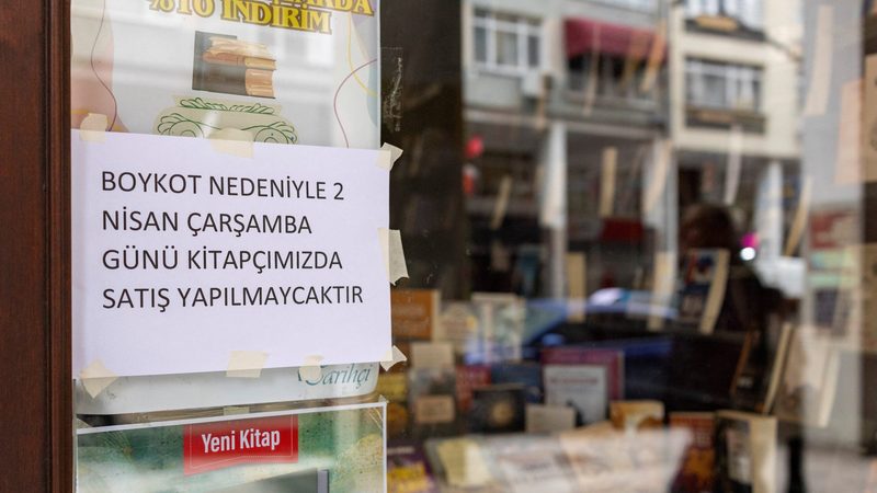 A note in a book store says it has joined the Turkish opposition's call for a shopping boycott following the arrest of Istanbul Mayor Ekrem Imamoglu