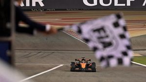 McLaren's Oscar Piastri passes the chequered flag to win the Bahrain Grand Prix on April 13, 2025
