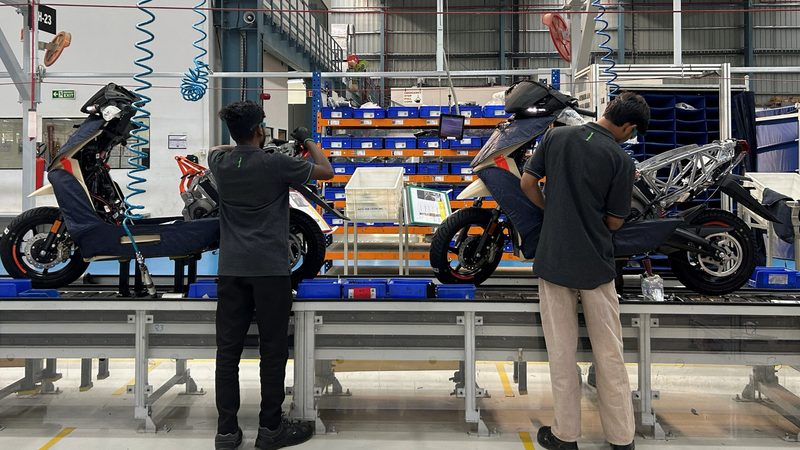 Workers assemble electric scooters at Ather Energy's factory in Hosur, Tamil Nadu. Adia says it has an "extensive portfolio" of Indian investments