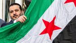 Syrian Foreign Minister Asaad Hassan al-Shibani at the raising of the new Syrian flag at the UN in New York