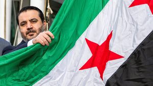 Syrian Foreign Minister Asaad Hassan al-Shibani at the raising of the new Syrian flag at the UN in New York