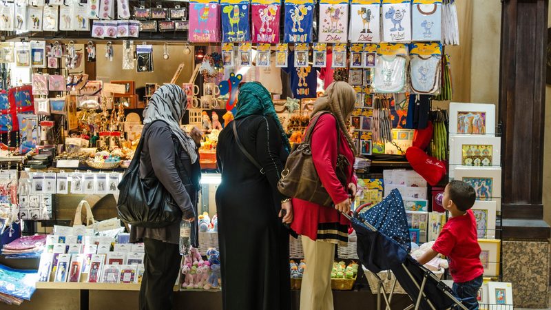 People shopping in Dubai. Mobile point-of-sale terminals are becoming more popular with SMEs but cash still dominates