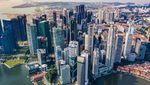 Downtown Singapore with the container terminal in the background. The city is an ideal trade-war haven