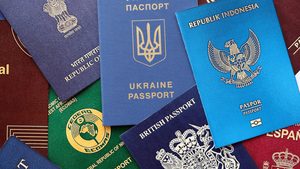 Many various passports of citizens of different countries and regions of the world close up