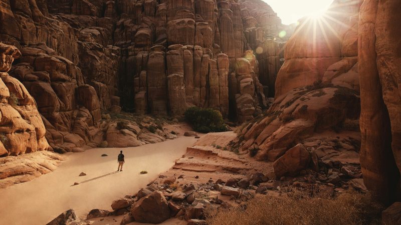 Sandstone rock formations rise above the Hisma desert, Neom
