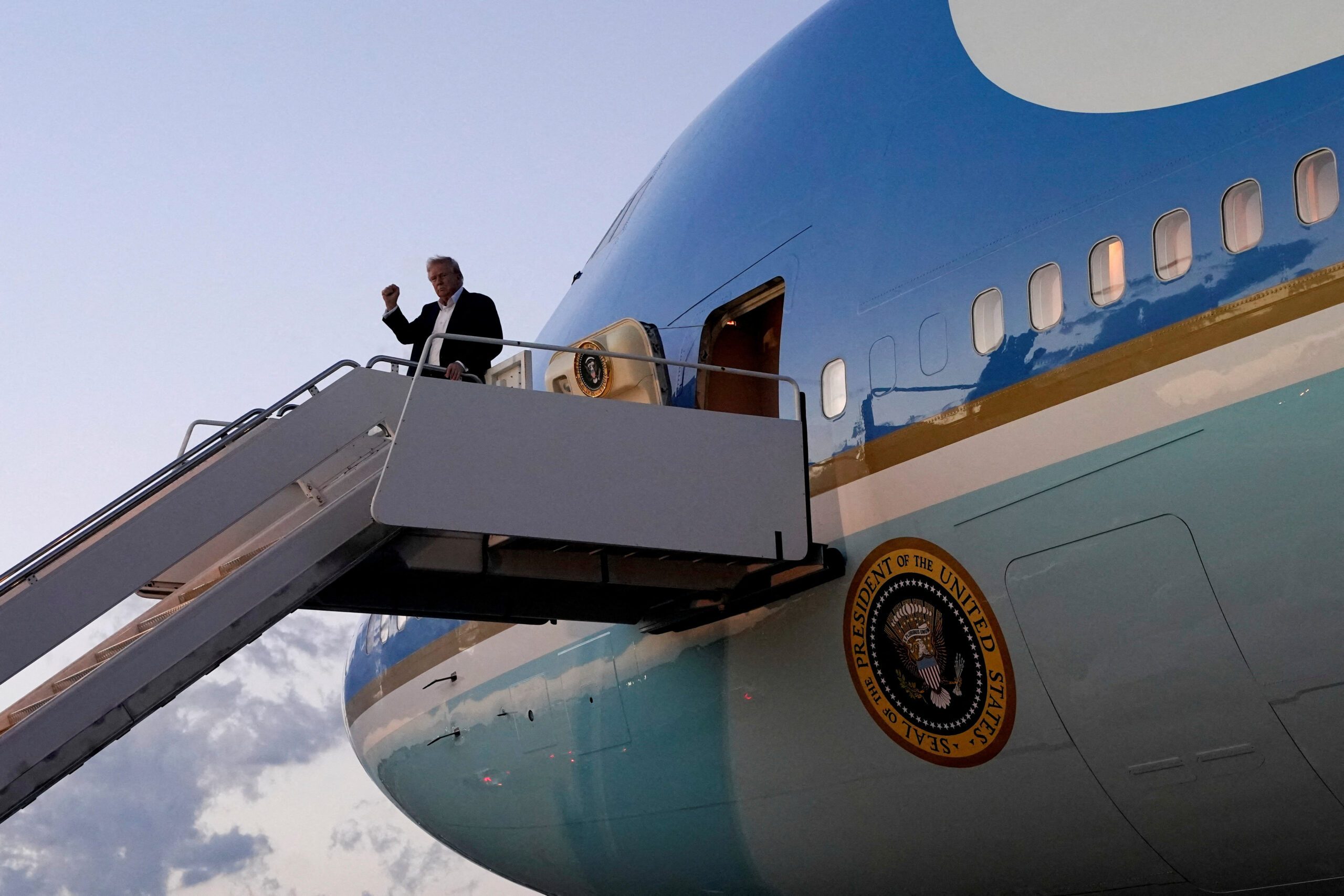 US President Donald Trump disembarks Air Force One. The Qatari 747 is intended to be a replacement