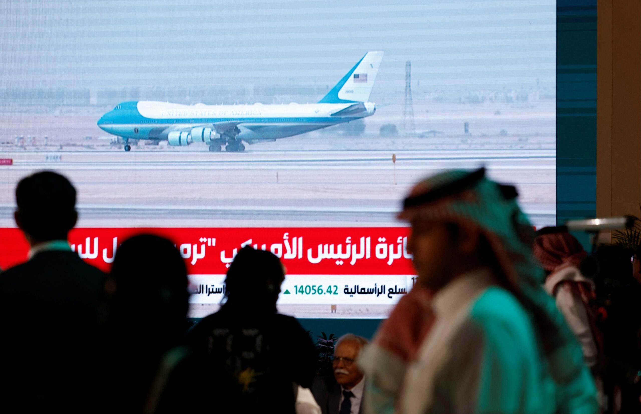 Air Force One is seen on a screen as it lands in Riyadh, Saudi Arabia. The new plane gifted by Qatar is worth $400m