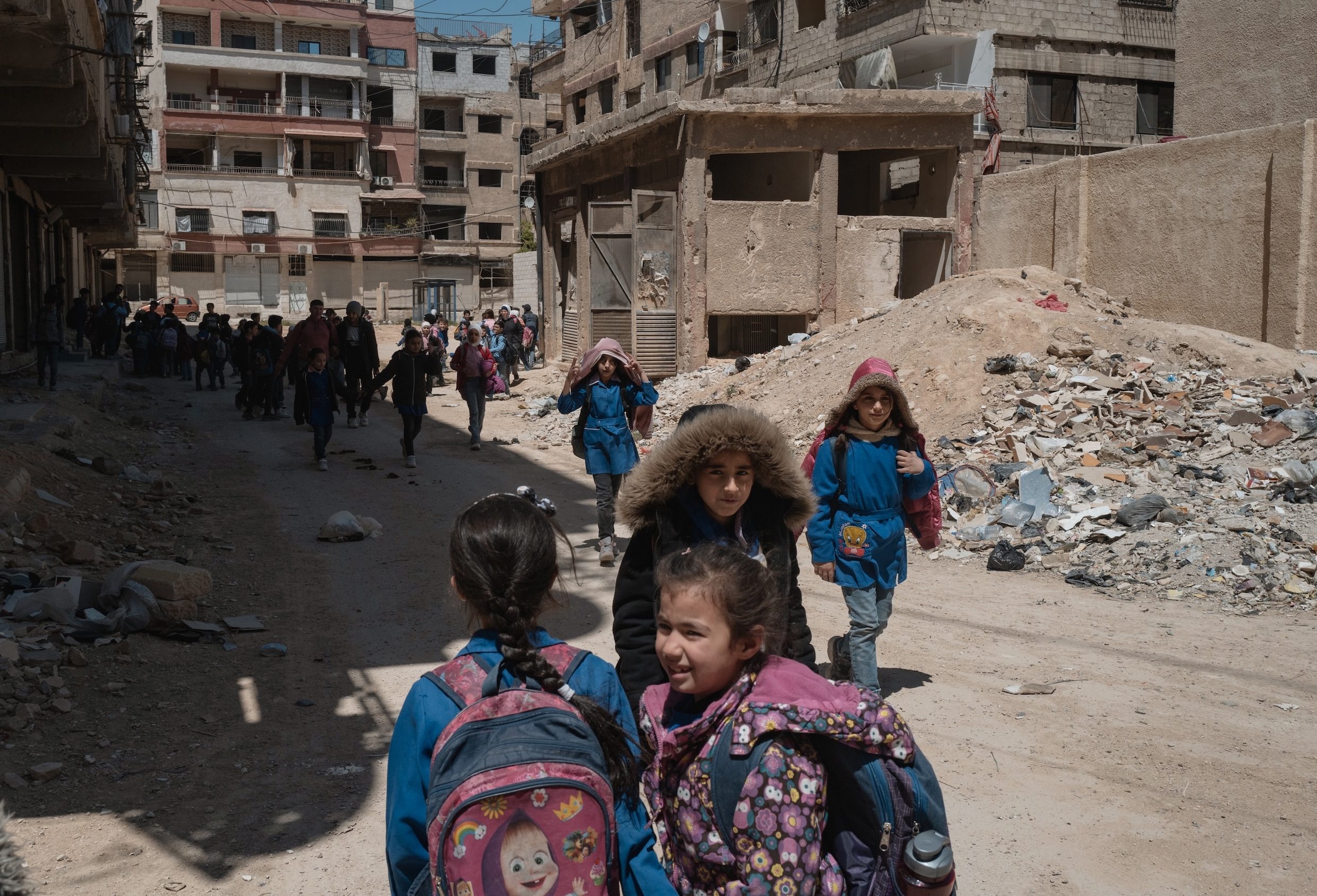Syrian children return to school in the war-damaged Damascus suburb of Jobar. US Secretary of State Marco Rubio wants US sanctions to be lifted immediately