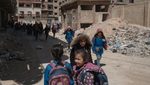 Syrian children return to school in the war-damaged Damascus suburb of Jobar. US Secretary of State Marco Rubio wants US sanctions to be lifted immediately