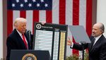 US president Donald Trump reveals his tariffs at the White House in April. A US trade court has ruled that Trump overstepped his authority