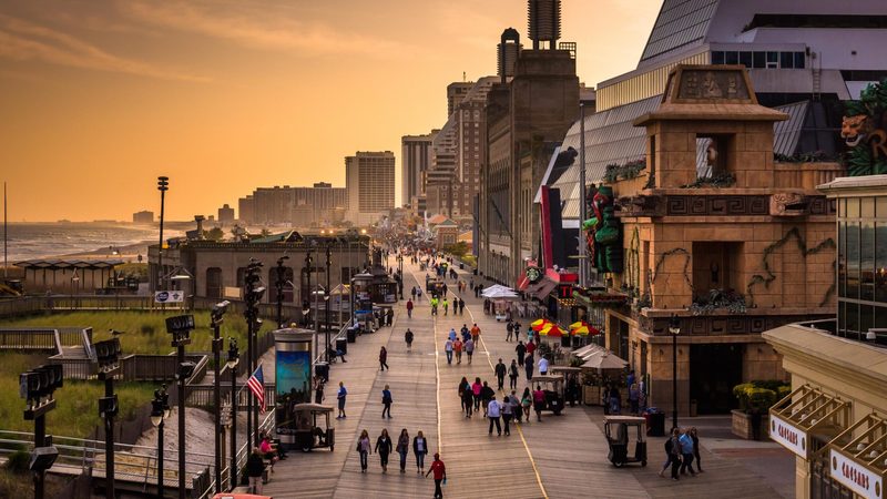 People stroll past multiple casinos on the famous boardwalk in Atlantic City, New Jersey. The US state and the UAE are focusing on 'cybersecurity and consumer protections'