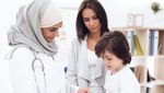 A doctor examines a sick child. Healthcare spending in Saudi Arabia will rise by nearly 9% a year up to 2029, according to Alpen Capital