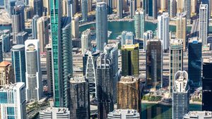 Dubai Marina skyline. A massive pipeline of over 250,000 new units is set to hit the market by 2026, prompting experts to predict a potential price adjustment and a cooling period