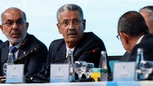 IHayan Abdel Ghani, Iraq's oil minister, signs a major deal with a Chinese firm to boost oil output and build new energy infrastructure near Basra