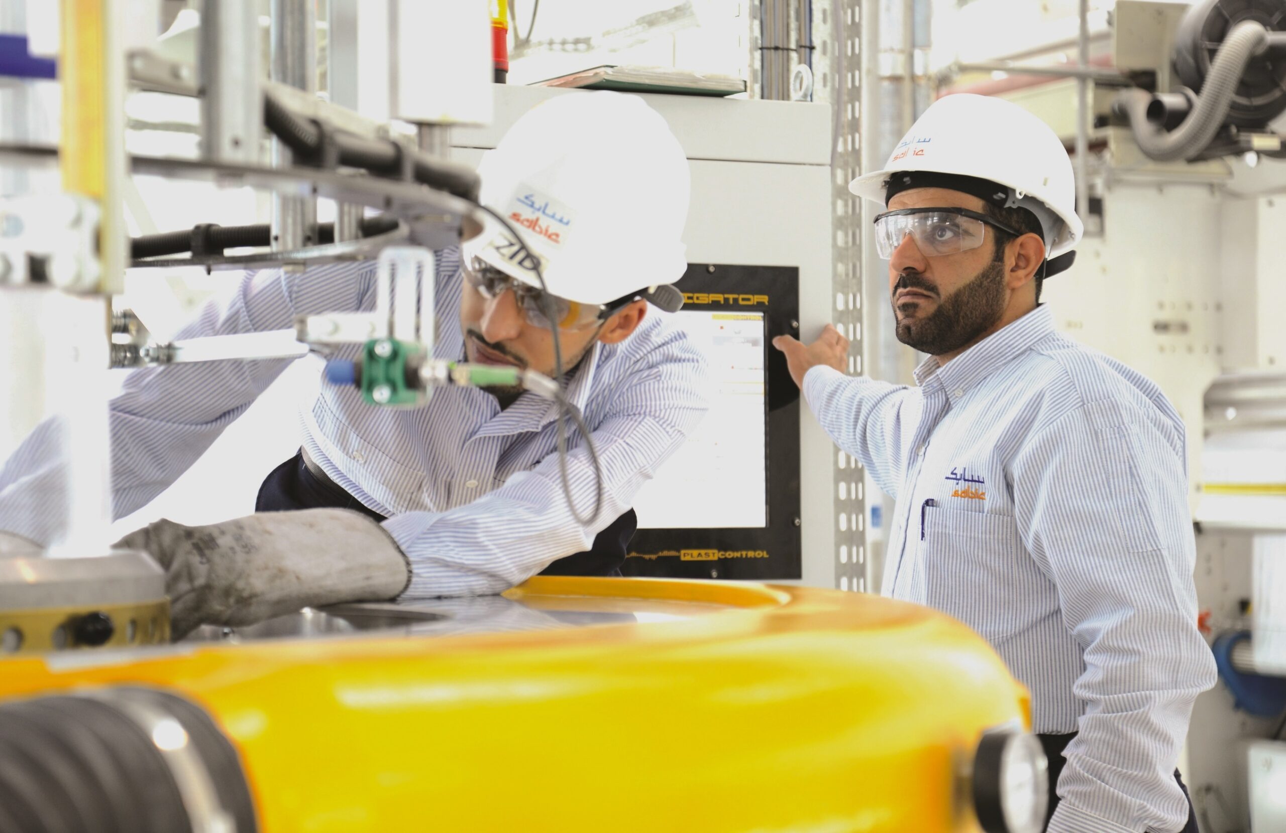 Workers at a Sabic plant in Jubail, Saudi Arabia. Oversupply will continue unless petrochemical companies begin to close plants, say analysts