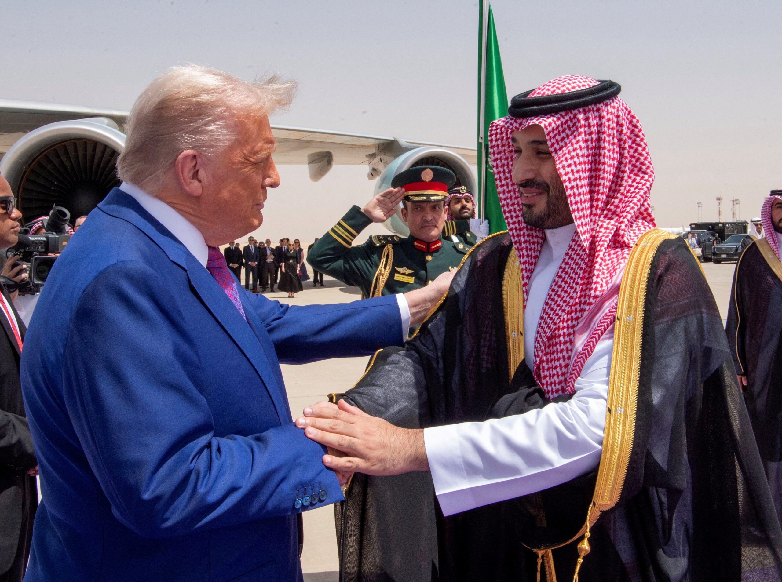 US President Donald Trump shakes hands with Saudi Crown Prince Mohammed Bin Salman. Economic promises seem to outweigh Oman's diplomatic efforts on President Trump's current trip
