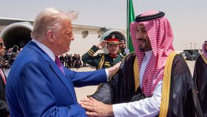 US President Donald Trump shakes hands with Saudi Crown Prince Mohammed Bin Salman. Economic promises seem to outweigh Oman's diplomatic efforts on President Trump's current trip
