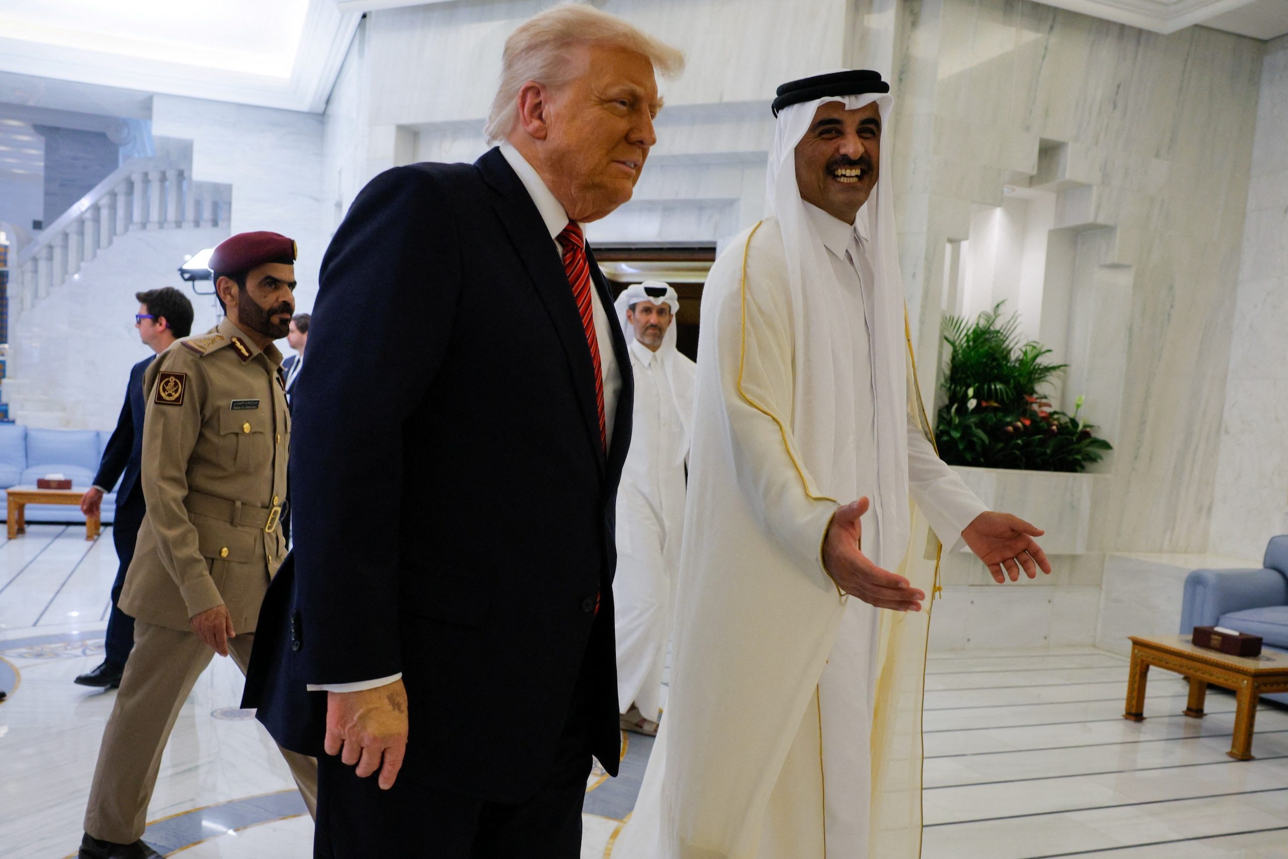 Donald Trump in the Gulf, with Qatar's Emir Tamim bin Hamad Al Thani. Al Thani said the countries were 'going to another level of relationship'