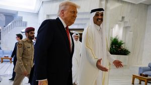 Donald Trump in the Gulf, with Qatar's Emir Tamim bin Hamad Al Thani. Al Thani said the countries were 'going to another level of relationship'