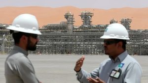 Saudi Aramco employees on site. The company has asked investment bankers to pitch ideas for how to raise funds from its assets