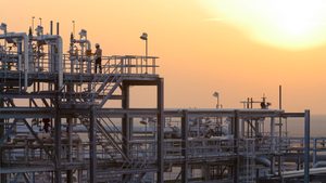 A lone worker at a Saudi Aramco gas plant. The company plans to increase investment in natural gas and in overseas projects