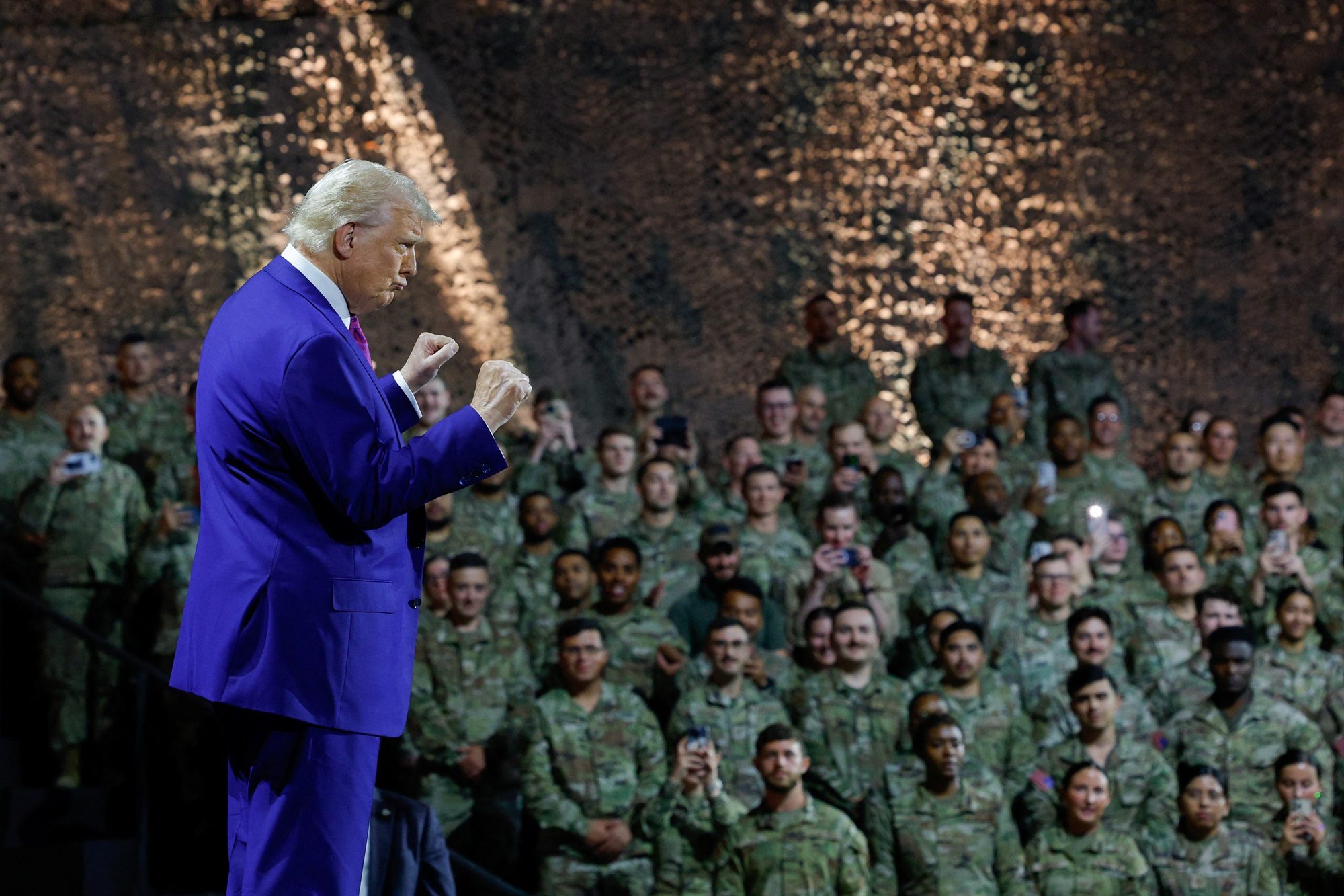 President Donald Trump during a visit to Al Udeid Air Base in Qatar. He says the country will invest $10 billion in the base