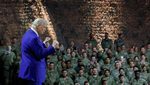 President Donald Trump during a visit to Al Udeid Air Base in Qatar. He says the country will invest $10 billion in the base
