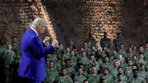 President Donald Trump during a visit to Al Udeid Air Base in Qatar. He says the country will invest $10 billion in the base