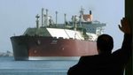 A Qatari LNG carrier in the Suez Canal. Shell says that by 2030, 60% of its extra LNG capacity will come from Qatar and the US
