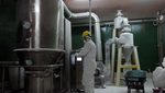 A worker handles lithium carbonate. Zhongke Electric's plant will be located in Oman's Sohar Port and Freezone
