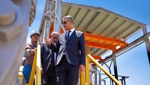 Iraqi oil minister Hayan Abdul Ghani (right) visiting an oil installation in Basra. Opec+ has accused the country of over-producing