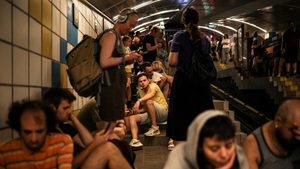 People take cover in a cable car tunnel in Haifa following a missile attack on Israel by Iran